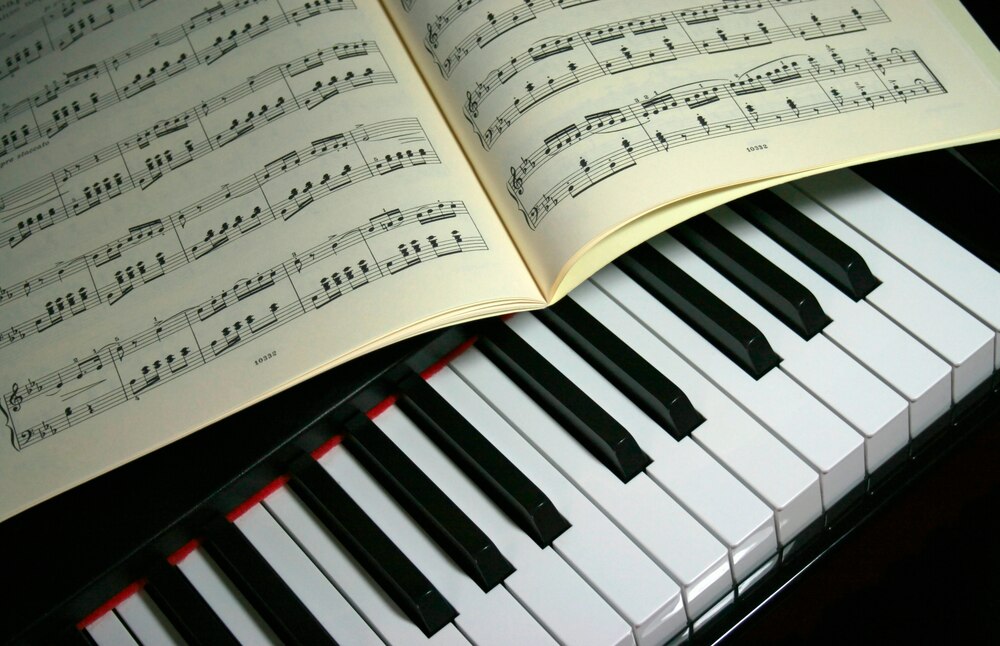 Vortrag mit Klaviermusik