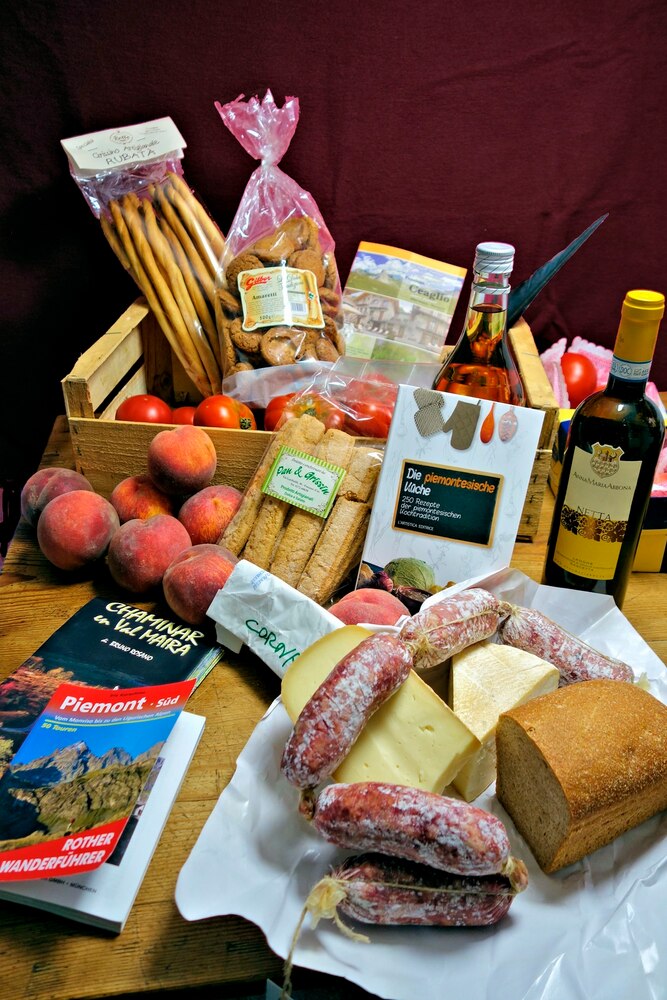 Pfarreireise:
über Auffahrt ins
Piemont